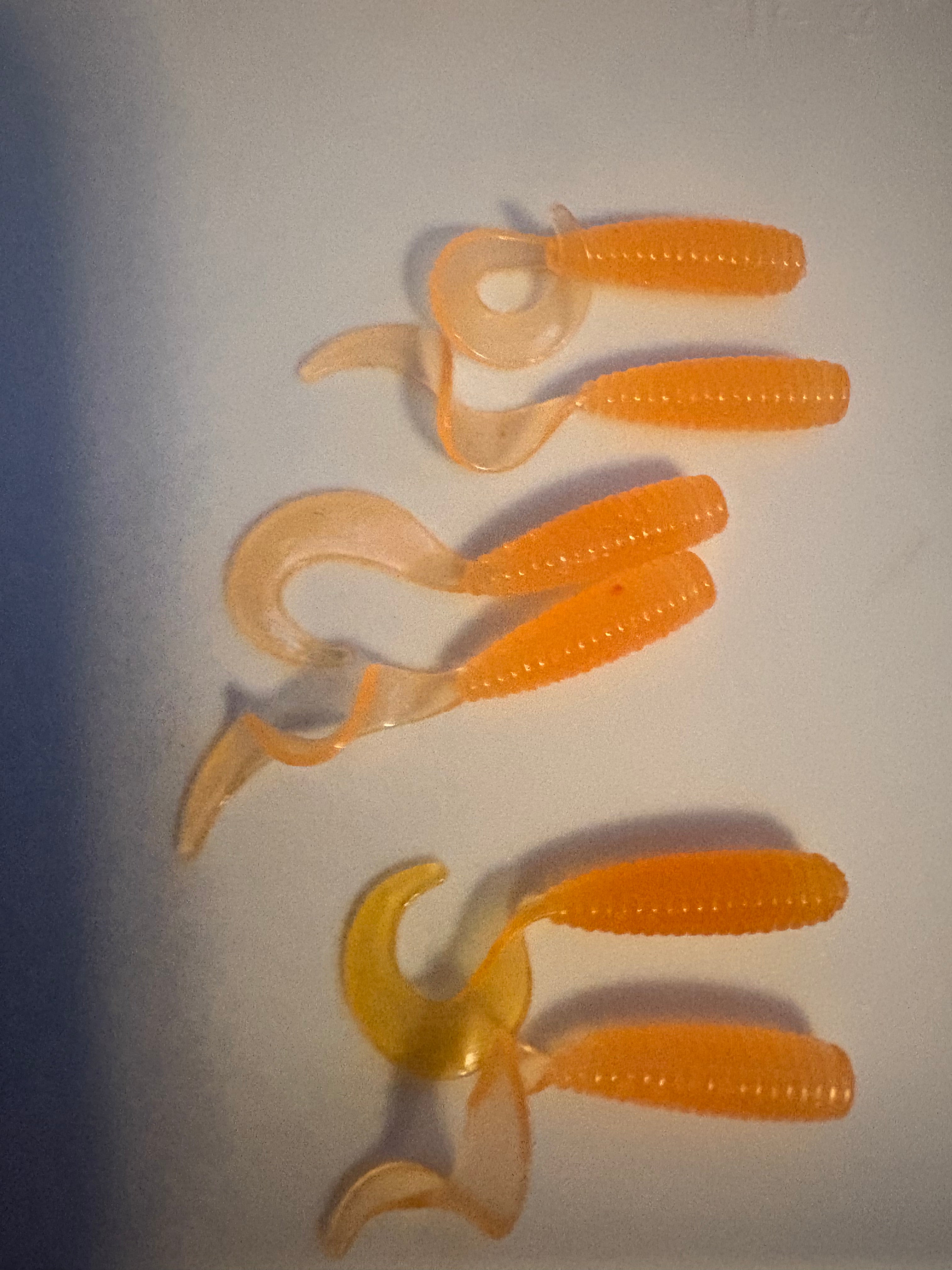 2 inch Tangerine Crappie Grubs Glow