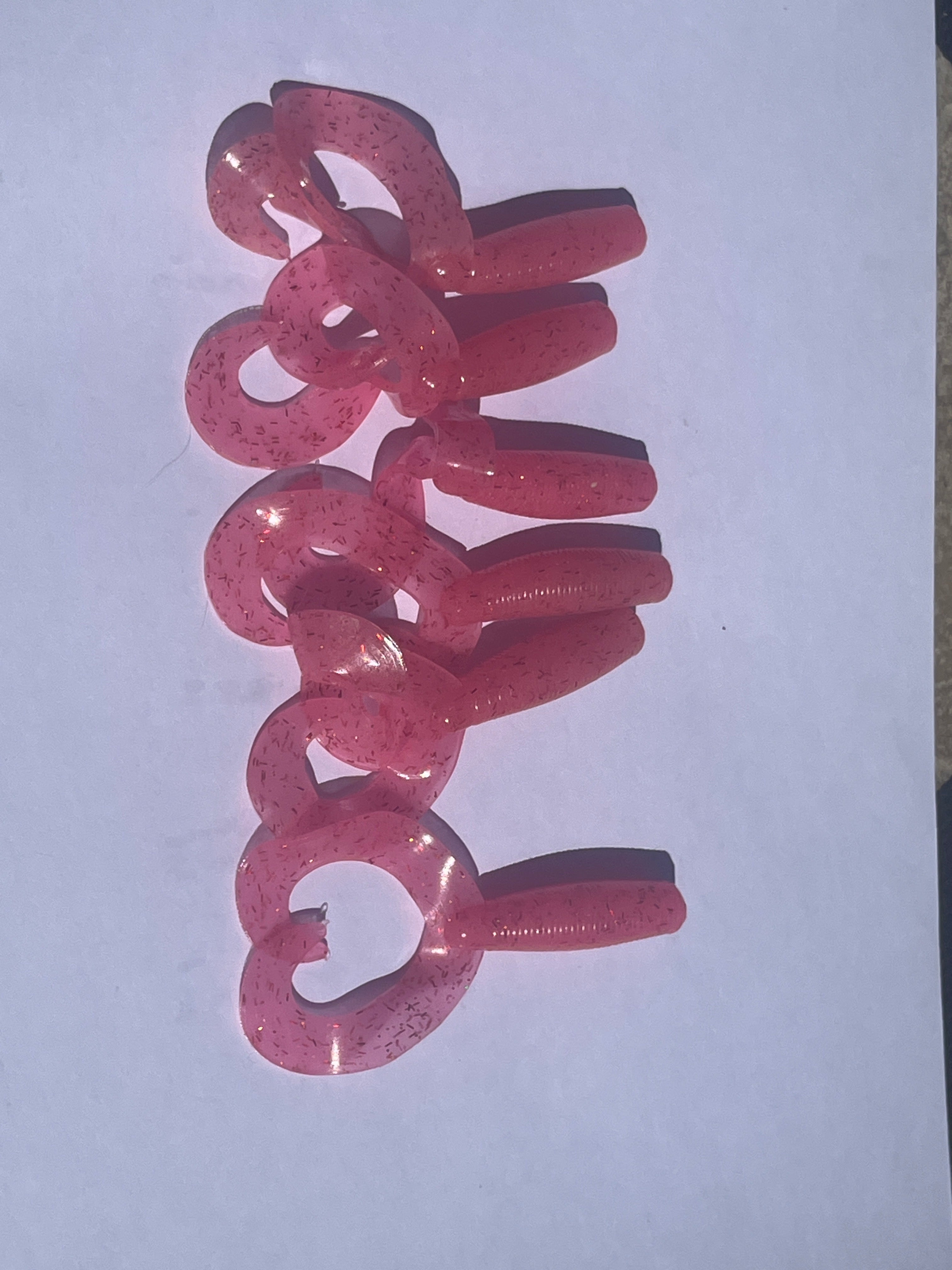 Pink Starburst with Red flakes Glow Hula Grubs